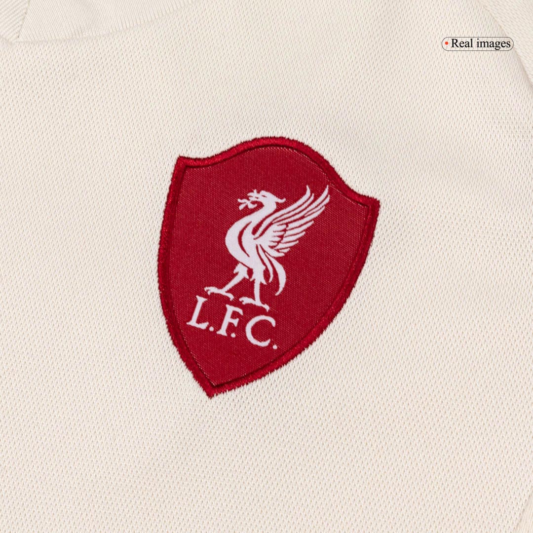 Gyerek Liverpool 
 Idegenbeli 
Mez 
Készlet (Mez + Nadrág + Zokni) 
2025/26 
 Fehér