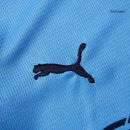 Gyerek Manchester City 
Otthoni 
Mez 
 
Készlet (Mez + Nadrág)2025/26 
 Kék